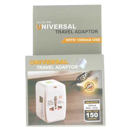 Packaging of a universal travel adapter with USB output on a white background