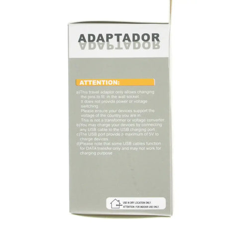 Box for a travel adapter with text and warning labels on a white background