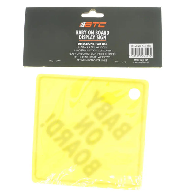 Yellow 'Baby On Board' display sign with packaging on a white background