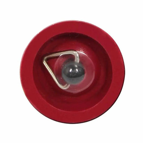 Red circular object with a central metallic component on a white background