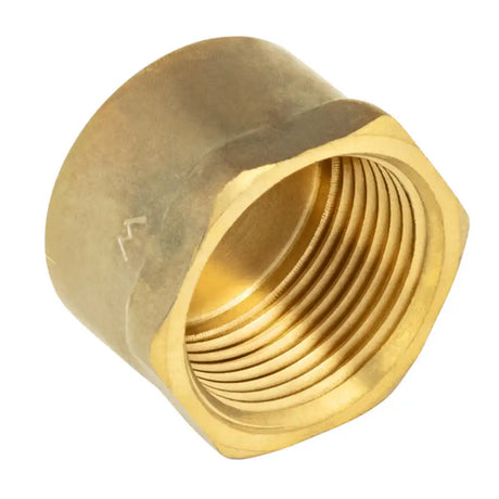 Brass female pipe thread cap on a white background