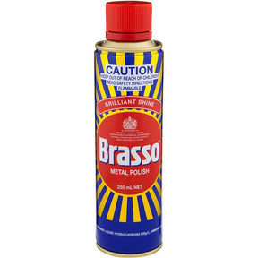 Brasso metal polish can with red cap on a white background