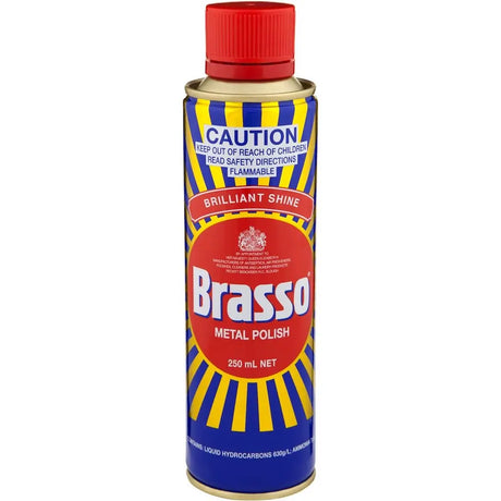Brasso metal polish can with red cap on a white background