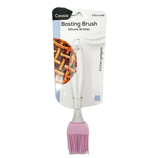 Pink basting brush with silicone bristles in packaging on a white background