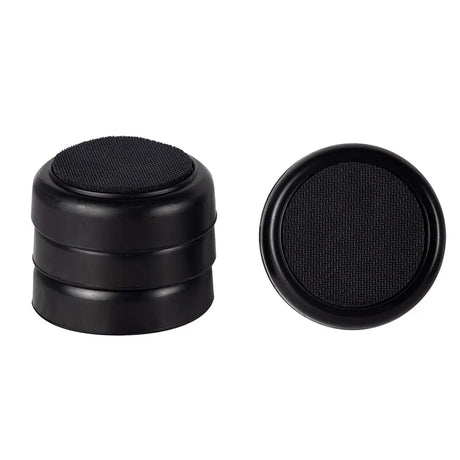 Black rubber grommets on a white background
