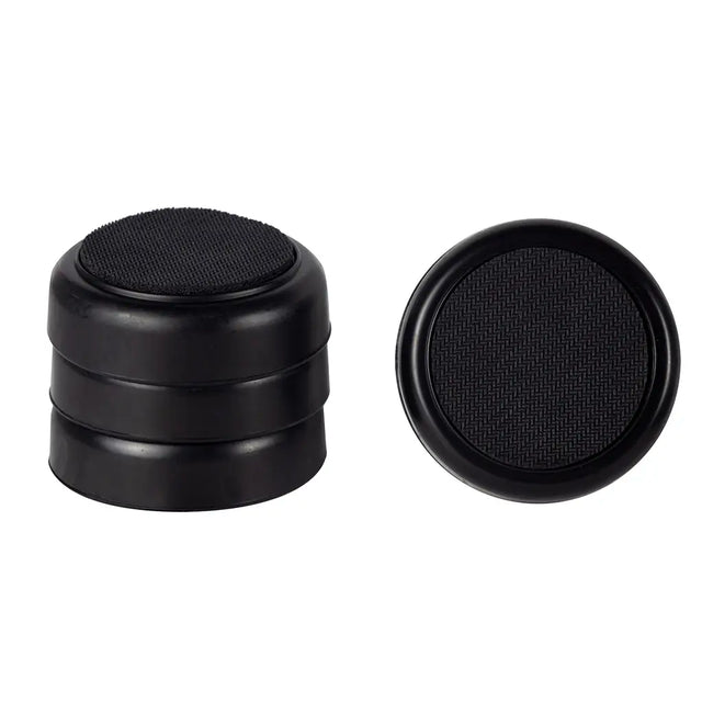 Black rubber grommets on a white background