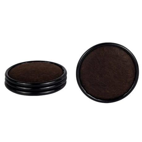 Two round dark brown objects with black rims on a white background