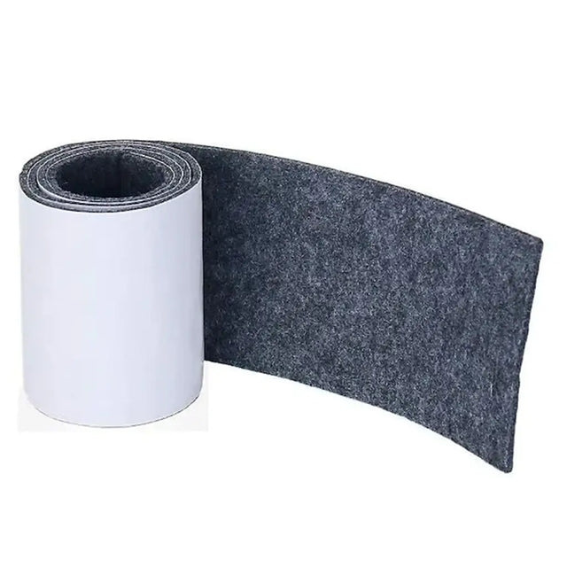 Roll of gray felt strip on a white background