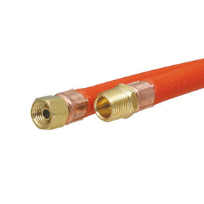 Red hose with brass connectors on a white background