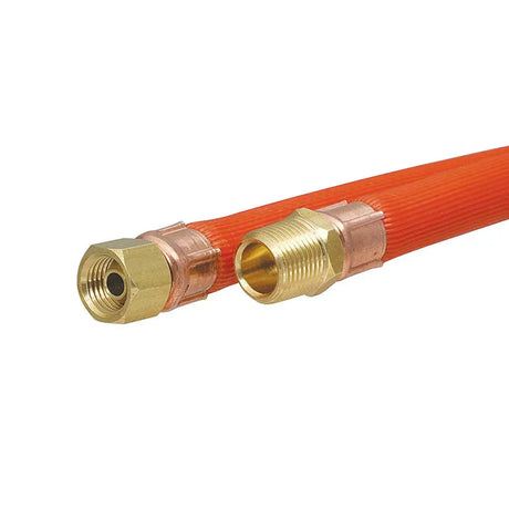 Red hose with brass connectors on a white background