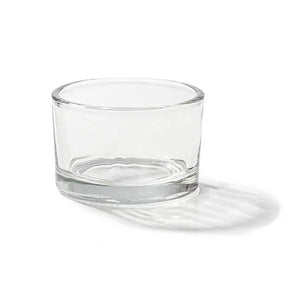 Clear glass cup on a white background
