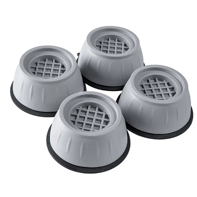 Four gray rubber feet with grid patterns on a white background