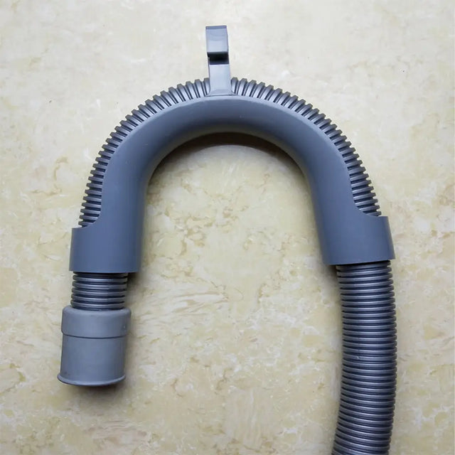 Gray flexible hose with a U-shaped design on a beige background