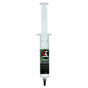 White syringe with a green and black label on a white background
