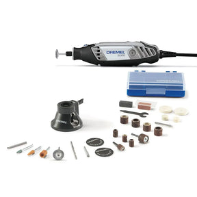 Dremel 3000 rotary tool kit with a silver and black rotary saw, various metal and wood bits, sanding discs, a blue storage case, and accessories arranged on a white background.