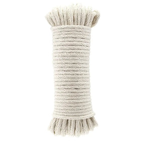 Coiled beige rope on a white background