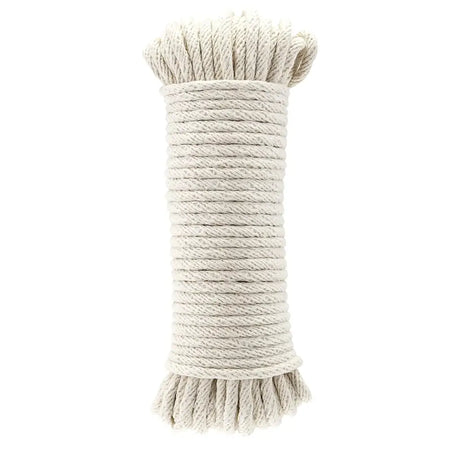 Coiled beige rope on a white background