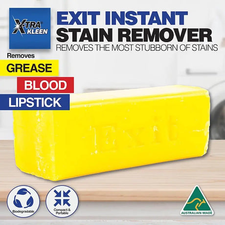 Yellow stain remover block with Xtra Kleen branding and text about its uses on a white background.