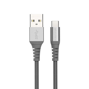 Gray USB cable with one end being a standard USB connector and the other an micro USB connector on a white background.