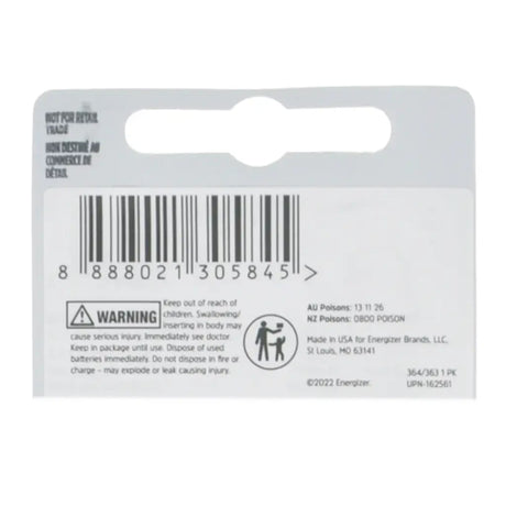 Back of a battery packaging with warning label and barcode