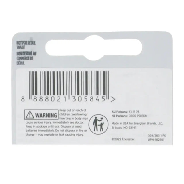 Back of a battery packaging with warning label and barcode