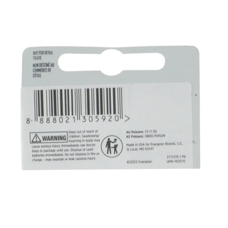 Back of a battery packaging with barcode and warning label on a white background
