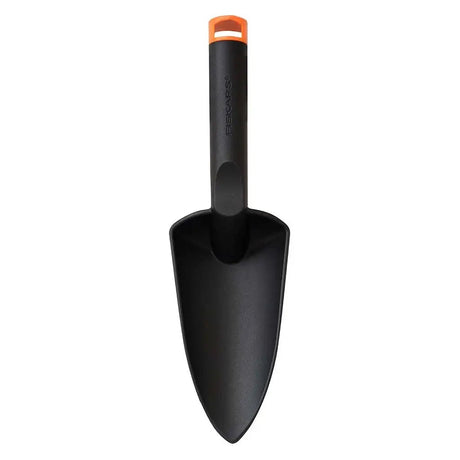 Black garden trowel with orange handle on a white background