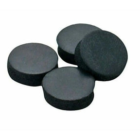 Four black round magnets on a white background