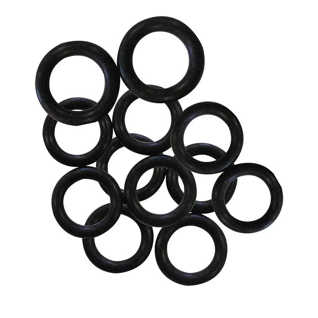 Multiple black rubber o-rings stacked on a white background