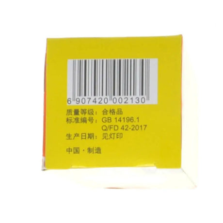 Yellow box with a barcode label on a white background