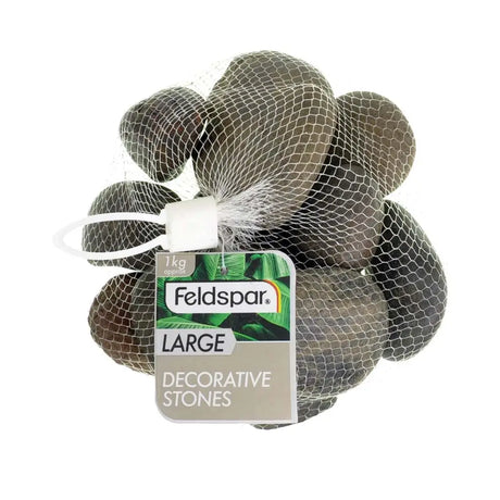 Packaged decorative stones with a label on a white background