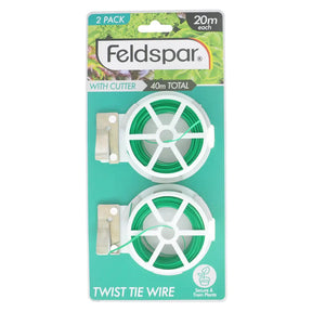 Feldspar twist tie wire packaging with two spools and a cutter on a white background
