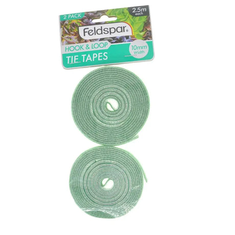 Two rolls of green tie tapes with a 'Feldspar' packaging label on a white background.