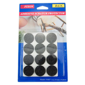 Pack of adhesive scratch protectors with FIXON branding on packaging