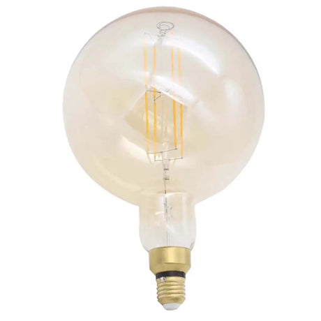 Vintage-style light bulb with a gold base on a white background