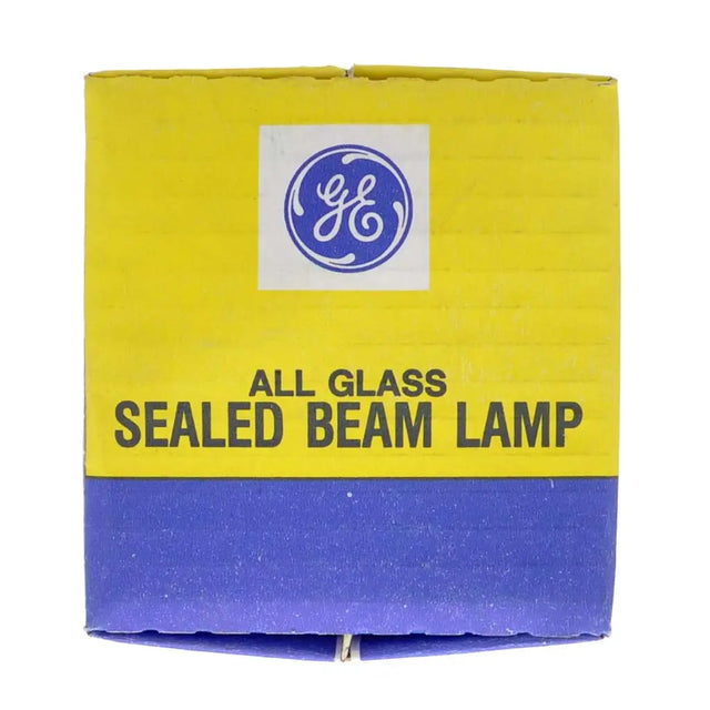 Yellow and blue box with General Electric logo and text 'All Glass Sealed Beam Lamp' on a white background