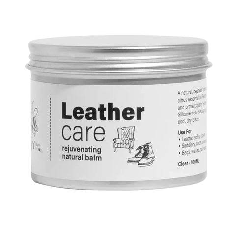 Jar of leather care balm with label on a white background