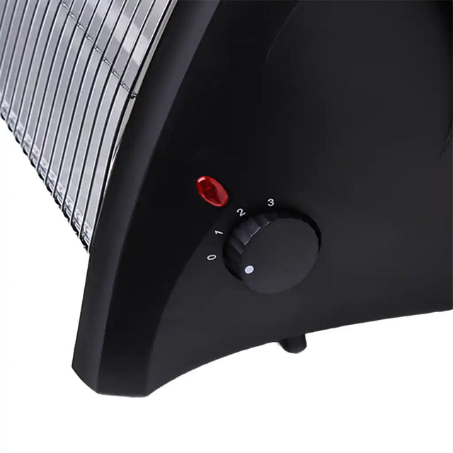 Black electric heater with control knob and indicator light on a white background