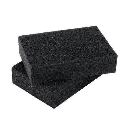 Two black foam blocks on a white background