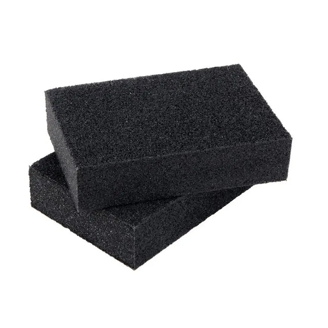 Two black foam blocks on a white background