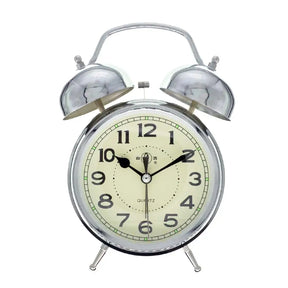 Vintage-style alarm clock with twin bells on a white background