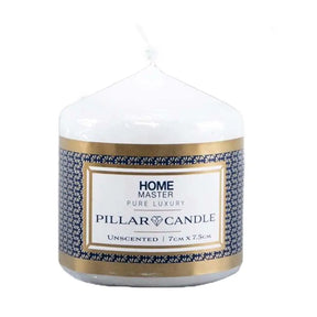 Pillar candle with a decorative label on a white background