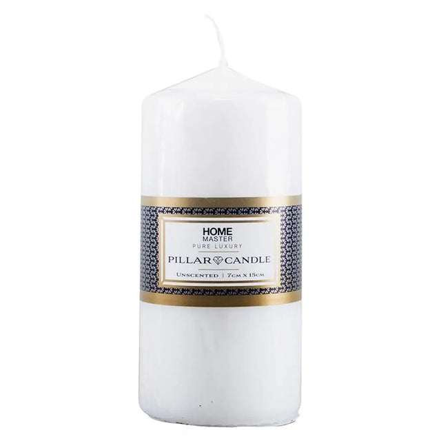 White pillar candle with a label on a white background