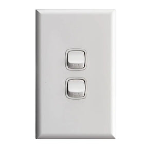 White wall switch with two rocker switches on a white background