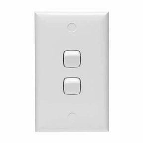 White wall switch plate with two silver rocker switches on a white background