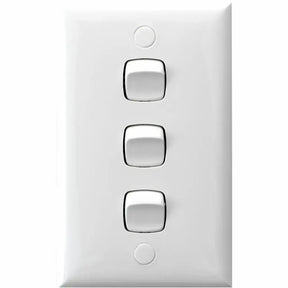 Three-button white wall switch on a white background
