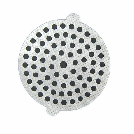 Round silicone mat with black dots on a white background
