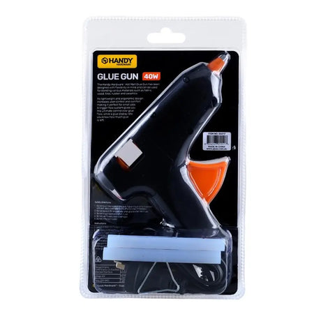 Handy glue gun in packaging on a white background