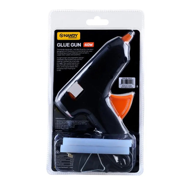 Handy glue gun in packaging on a white background