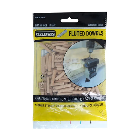 Packaged fluted dowels with Haron branding on a white background
